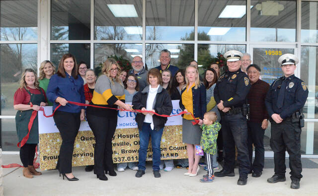 129217696_web1_queen-city-hospice-grand-opening
On Dec. 20, Queen City Hospice presented a ribbon-cutting ceremony that opened the doors to a new office located on 19585 U.S. 68, Fayetteville, Ohio 45118. Photo by Wade Linville