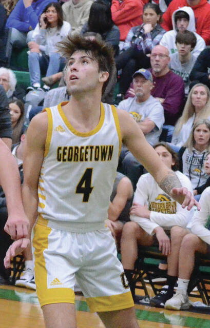 129254281_web1_carson-miles
Georgetowns Carson Miles fired for 24 points to lead the G-Men in scoring during their Jan. 6 non-league game against Summit Country Day. Photo by Wade Linville