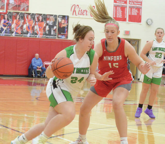 129295759_web1_cassidy-feldhaus
Fayettevilles Cassidy Feldhaus drives to the hoop during the Lady Rockets Jan. 21 non-league game against Minford. Photo by Wade Linville