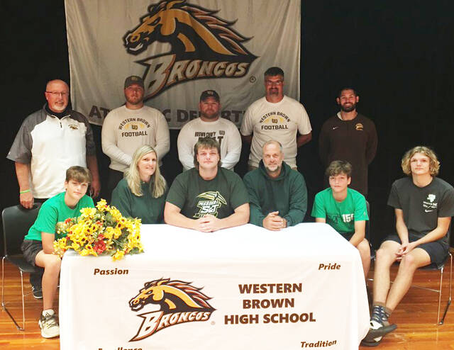 129728938_web1_WB_football_signing_AndrewSandefur
Western Brown High School football player Andrew Sandefur, front row third from left, recently signed to play football at Missouri S&T University in Rolla, Missouri. Photo: Western Brown High School