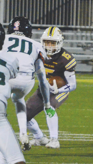 130010765_web1_jayden-parker
Western Browns Jayden Parker looks for space to run after grabbing a reception in the Broncos week six win over Batavia. Photo by Wade Linville