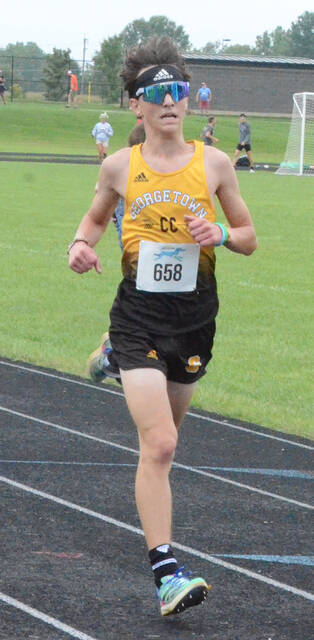 Georgetown senior Jacob Faught competed in the Division III 5K boys race, and finished seventh with a time of 17:17 and will advance to the OHSAA Regional Championship Meet. Pictured is Faught competing earlier this fall. Photo by Wade Linville
