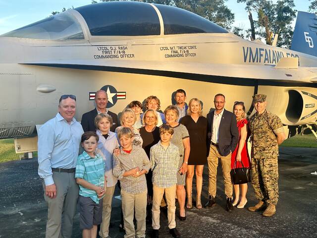 Rash and Conte families at the dedication and retirement of F/A-18D.