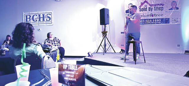 130125030_web1_IMG_0149--1-
Stand-up comedian Chris Siemer performs for the crowd during the first annual Comedy for a Doggone Cause fundraiser for the Brown County Humane Society Animal Shelter held Nov. 4 in Georgetown. Photo by Wade Linville