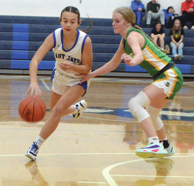 130216543_web1_alyssa-fisher-2
Ripleys Alyssa Fisher drives to the hoop during the Dec. 11 win over West Union. Photo by Wade Linville