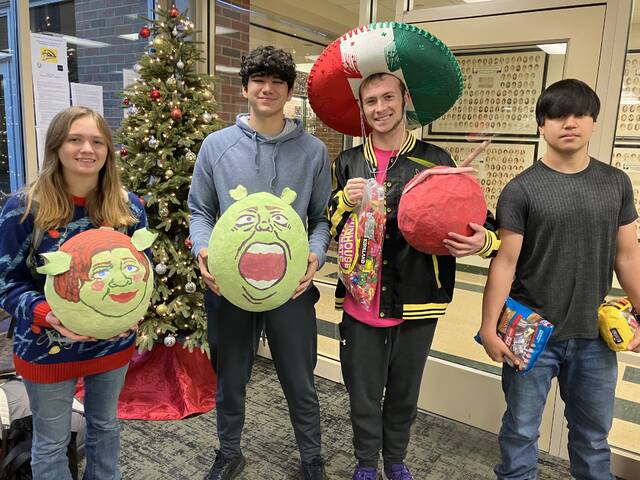 130244898_web1_IMG_0571
The Western Brown High School Spanish Club recently hosted its annual candy sale/piñata raffle. Muchas gracias y Feliz Navidad from the Spanish Club - Aaryn Juana Hatfield, Adam Santos Peña, Trent Mario Seibert and John Juan Martin.