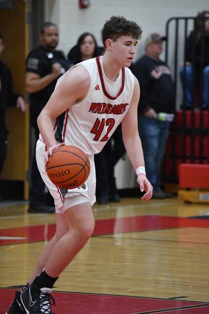 130395654_web1_IMG_0737
Eastern sophomore Grady Barber shot for 20 points to lead the way in scoring against Portsmouth West while also pulling down 11 rebounds for a double-double. Photo provided
