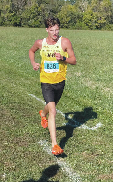 <p>Western Brown senior Brayden Dill competes for a fifth place finish in this year’s Southern Buckeye Athletic/Academic Conference American Division Cross Country Championship Meet at Washington Township Park on Oct. 11, earning SBAAC American Division First Team honors for the fourth straight year. Photo provided</p>