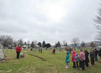 
			
				                                Gathering for the 2025 Wreaths Across America Day ceremony held at Ripleys Maplewood Cemetery on Dec. 13. Photo by Wade Linville
 
			
		