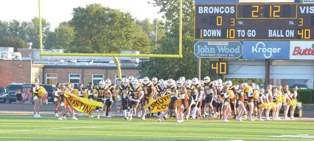 The Western Brown Broncos take the field for their week three game against Chillicothe, Sept. 4. Photo by Wade Linville