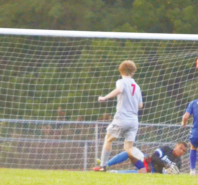 Ripley goalkeeper John Perraut grabs a save during the Blue Jays Sept. 11 match against Glenwood New Boston. Photo by Wade Linville